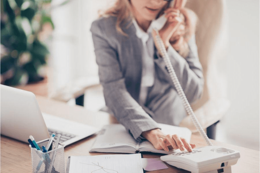 productivity of your legal secretariat through automation, woman in suit calling