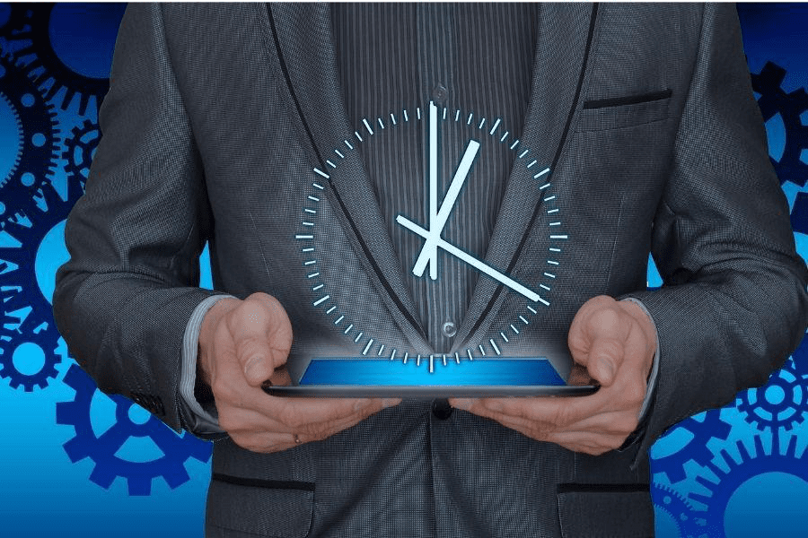 5 tools to help legal professionals increase productivity, man holding a digital clock